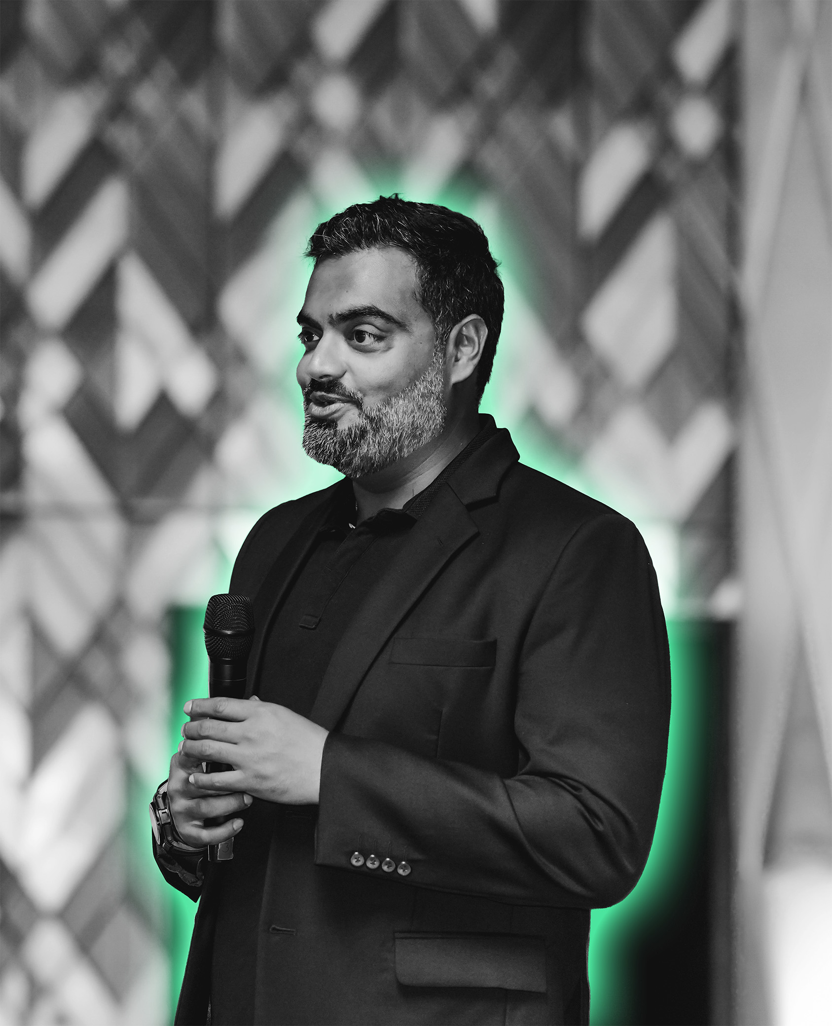 Rajiv Ramnath, Promocell's CEO, speaking on stage at a company event