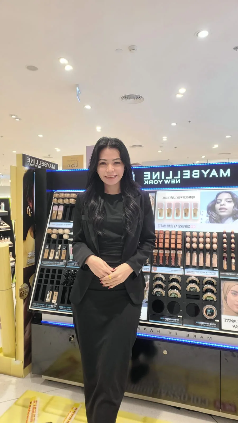 A beauty advisor at the Maybelline New York stand during the Lifestyle beauty event.
