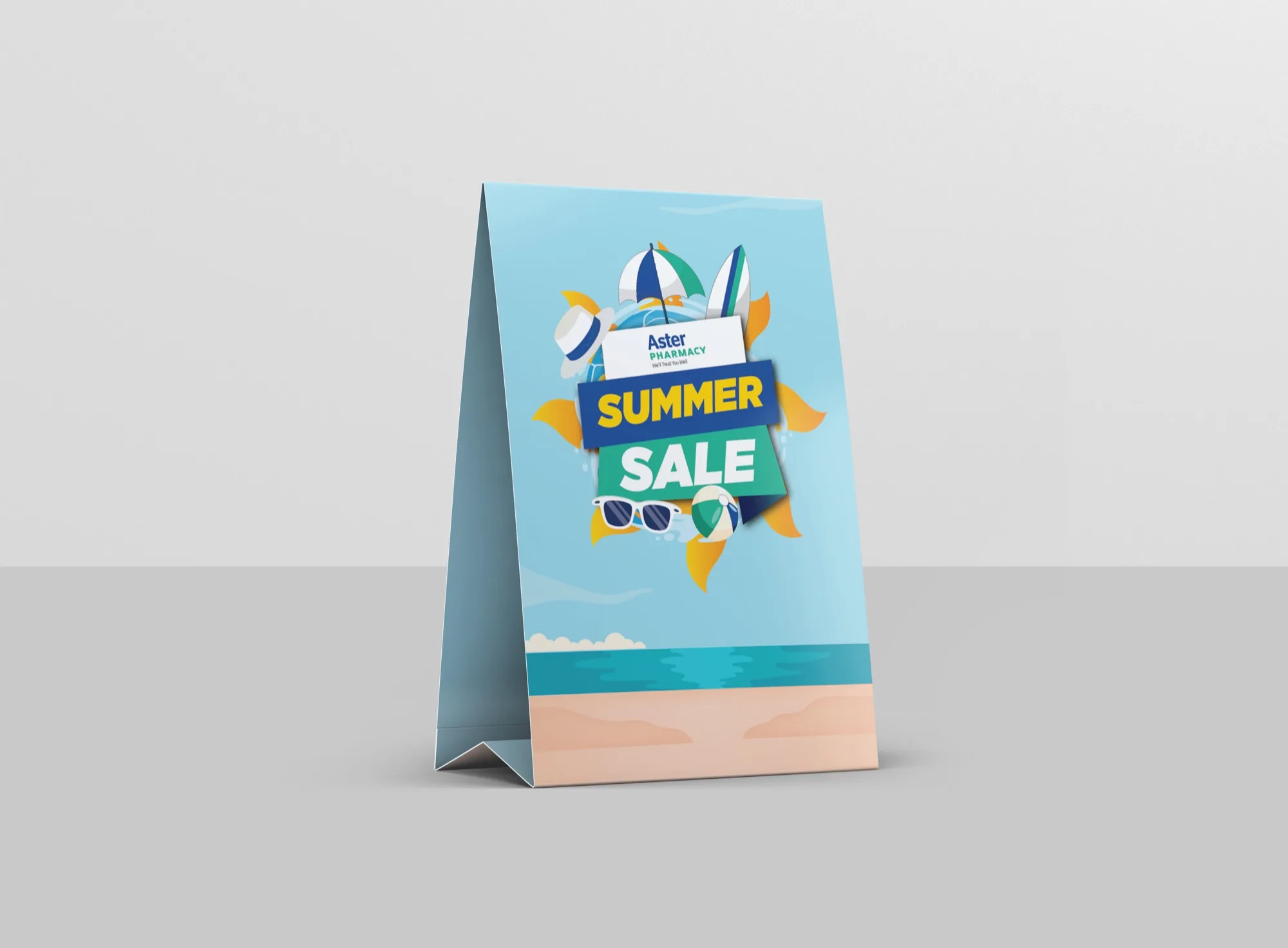 Summer Sale tabletop tent card at a pharmacy counter
